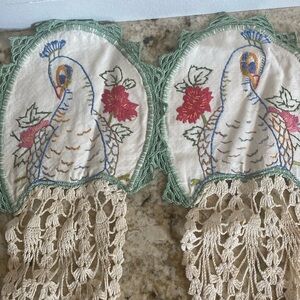 Vintage needle point peacock doilies